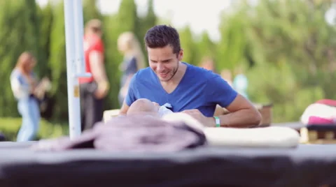 Young dad playing with a small child Stock Footage 54669541