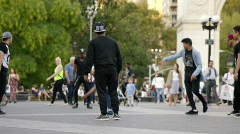 Young dance crew battling, break dancing in Washington Square Park in 4K NYC Stock Footage 55172990