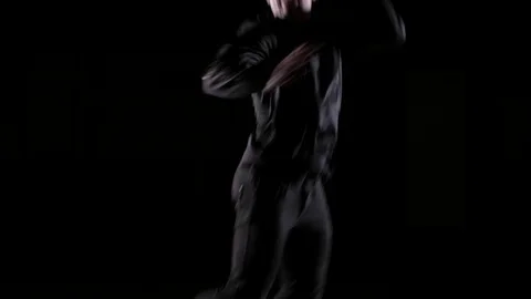 Young dancer dancing break dance, hip hop, street dancing in the studio, isolate 库存影片 121515046