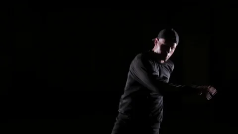 Young dancer dancing break dance, hip hop, street dancing in the studio, isolate Video stock 121515075