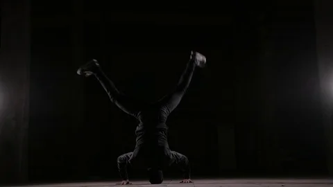 Young dancer dancing breakdance, hip hop, street dancing in the studio, isolate Stock Footage 121515011