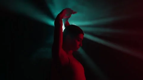 Young dancer delivers captivating improvised contemporary dance performance Stock Footage 243090566