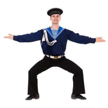 Young dancer dressed as a sailor posing on an isolated white background Stock Photos