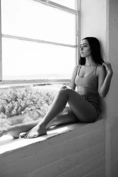 Young dancer portrait at window background. Stock Photos
