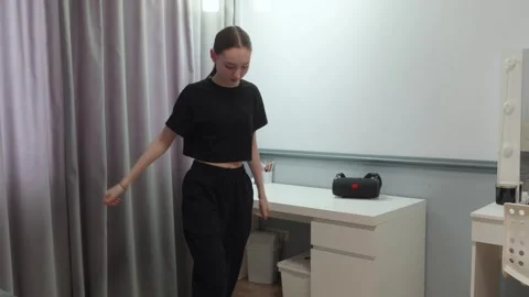 Young dancer practicing moves in her bedroom Stock Footage 310290214