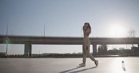 Young dancer warming up on street Stock Footage 209551460