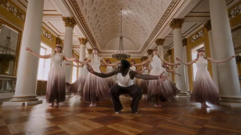 Young Dancers Performing Synchronized Routine In Grand Hall Stock Footage 317997513