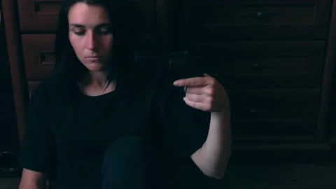 Young depressive woman trying to commit suicide with gun. The concept of social  Stock Footage 200775147