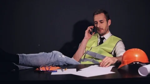 The young designer talking on the phone Stock Footage 81268311