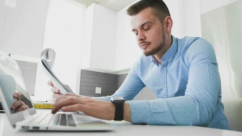 Young designer working in creative office with glass walls Stock Footage 104321378