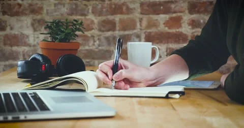 Young designer working on a creative project using the tablet Stock Footage 62240443