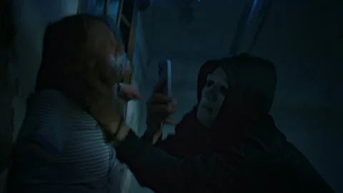 Young Desperate Captive Lady Fighting against Perverse Masked Kidnapper Stock Footage 293695725