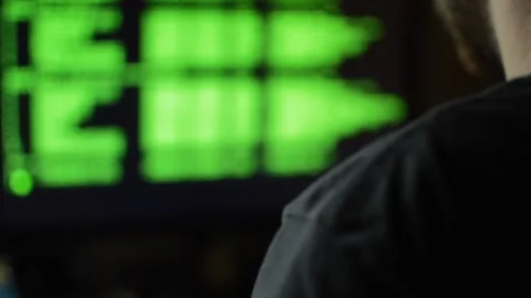 Young developer coding a program on a dark room. code developer. Stock Footage 219862089