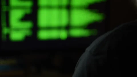 Young developer coding a program on a dark room. code developer. Stock Footage 219862128