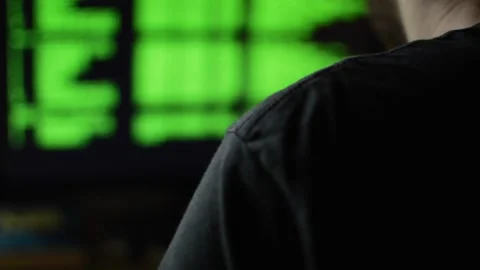 Young developer coding a program on a dark room. code developer. Stock Footage 219862171