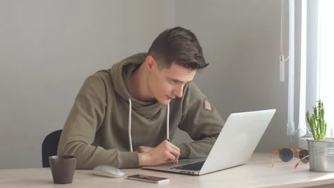 Young developer programmer concentrated on coding Stock Footage 102276963