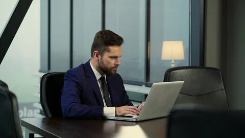 The young director is working in his office. Stock-Footage 105430982