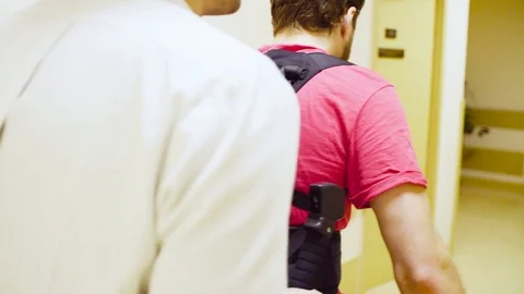 Young disable man walking in the robotic... | Stock Video | Pond5
