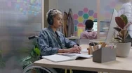 Young Disabled African American Business Woman Using Computer Brainstorming Stock Footage
