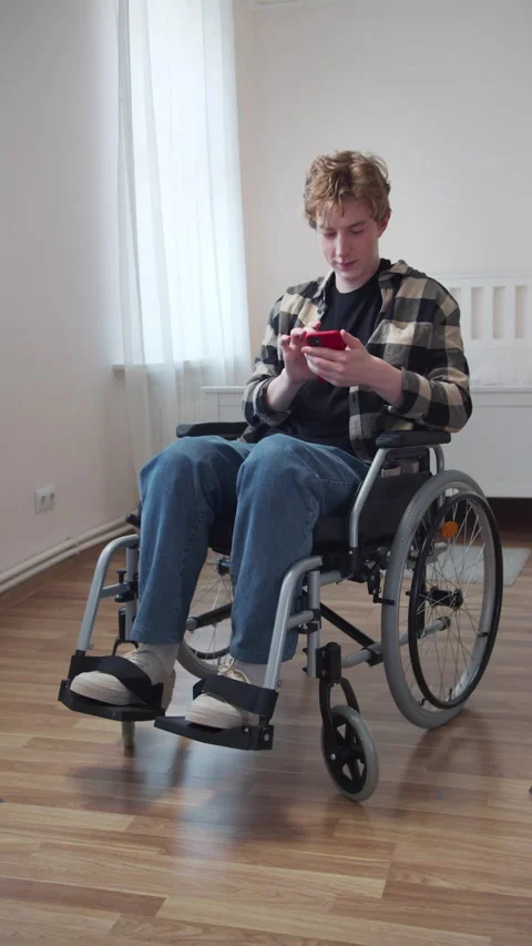 A young disabled man is chatting on the Internet Stock Footage 163069254