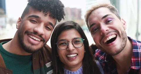 Young diverse friends smiling on camera outdoor Stock Footage 175792555
