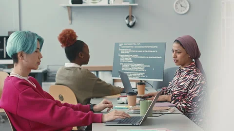 Young Diverse Team of IT Specialists Coworking in Office Stock Footage 241265476