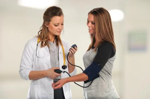 Young Doctor Checking patient Stock Photos