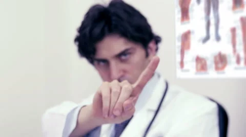 Young doctor denied to do something- hand gesture to say no Stock Footage 64721991