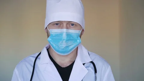 Young Doctor Looking at The Camera Video stock 69791161