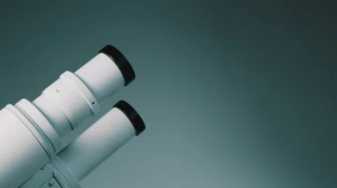Young doctor  looking through the microscope 動画素材 56352394