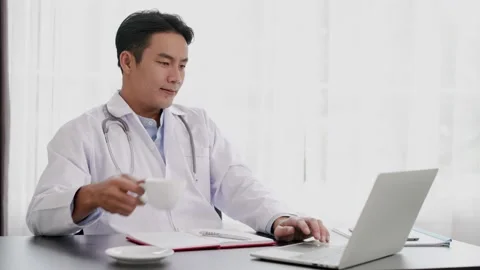 Young Doctor use laptop computer researching  about medical Stock Footage 152500248