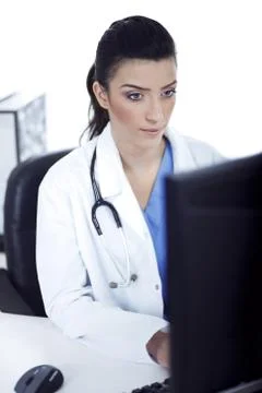 Young doctor working in the computer 库存照片