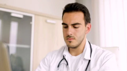 Young Doctor Working On Stock Footage 87767550
