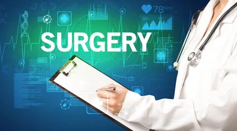 Young doctor writing down notes Stock Photos