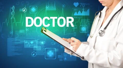 Young doctor writing down notes Stock Photos