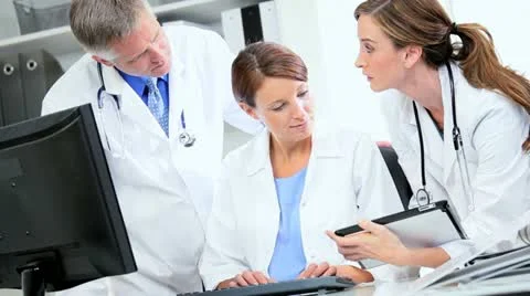 Young Doctors Checking Patient Information Video stock 11369782