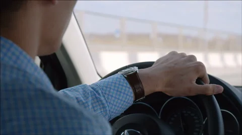 Young driver turns the steering wheel driving fast on a highway Stock Footage 40737315