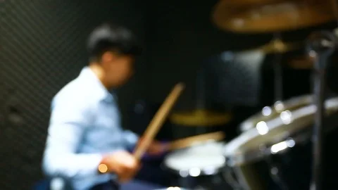 Young drummer playing at drums set, Human hands playing the drum kit in music Stock Footage 111868012