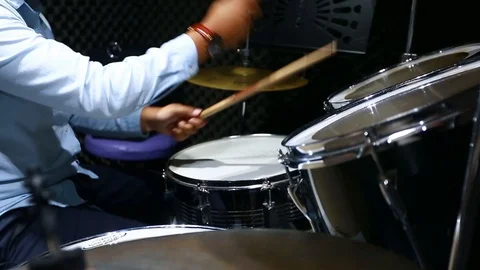 Young drummer playing at drums set, Human hands playing the drum kit in music Stock Footage 111868128