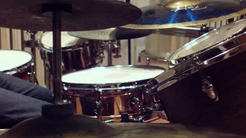 A young drummer plays on the set Stock Footage 98941475