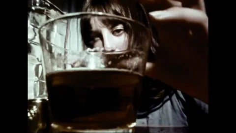 Young Drunk Female Drinking And Passing Out On Telephone Device Stock Footage 102808258