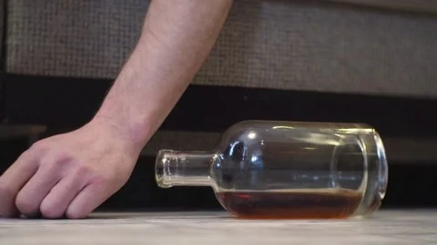 A young drunk man sleeps on the floor. Stock Footage 100626569