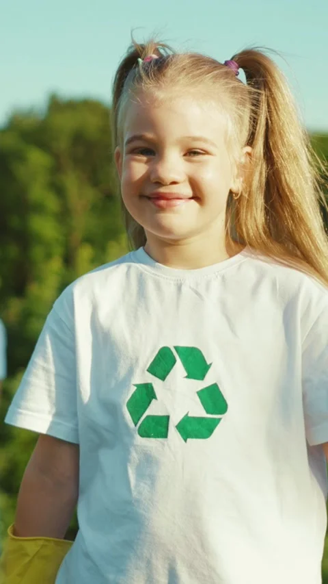 A Young EcoWarrior Actively Promoting Recycling and Environmental Awareness Stock Footage 314368287