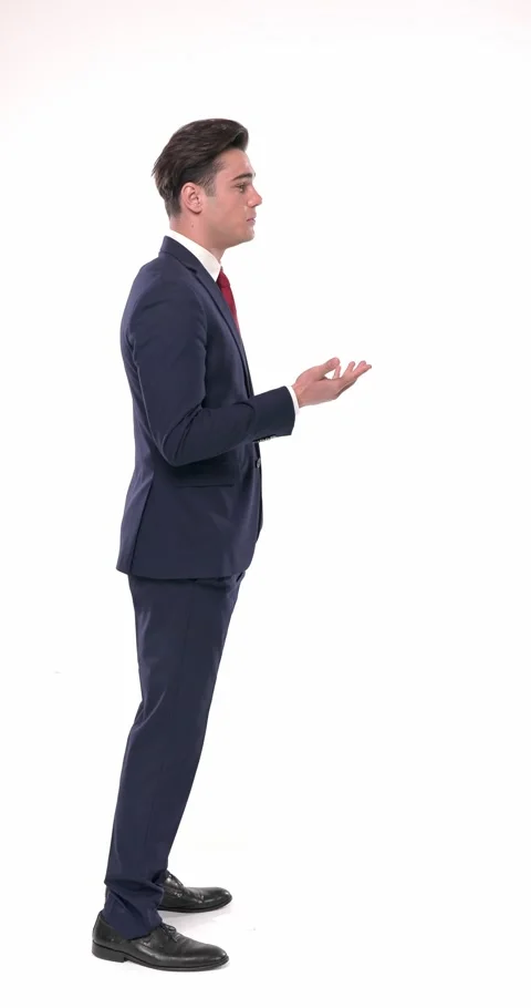 Young elegant man in navy blue suit having a conversation with the person in Stock Footage 308383879