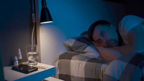 Young employee man with sleep problems and insomnia symptoms. Sleepless man all Stock Footage 145439864