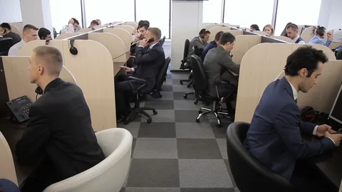 Young employees make calls, working in call center of bank. Stock Footage 85492549