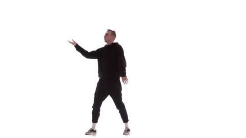 Young energetic guy dancing hip hop, freestyle, street dance, isolated Stock Footage 130376043