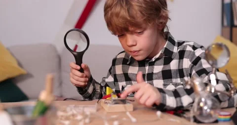 Young engineer. Boy passionate about electronics. DIY kid. Inventions and Stock Footage 171863687