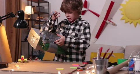 Young engineer. Boy passionate about electronics. DIY kid. Inventions and Stock Footage 171865109