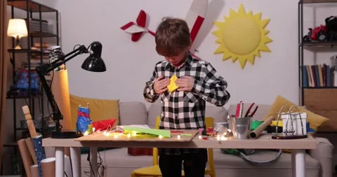 Young engineer. Boy passionate about electronics. DIY kid. Inventions and Stock Footage 171865258